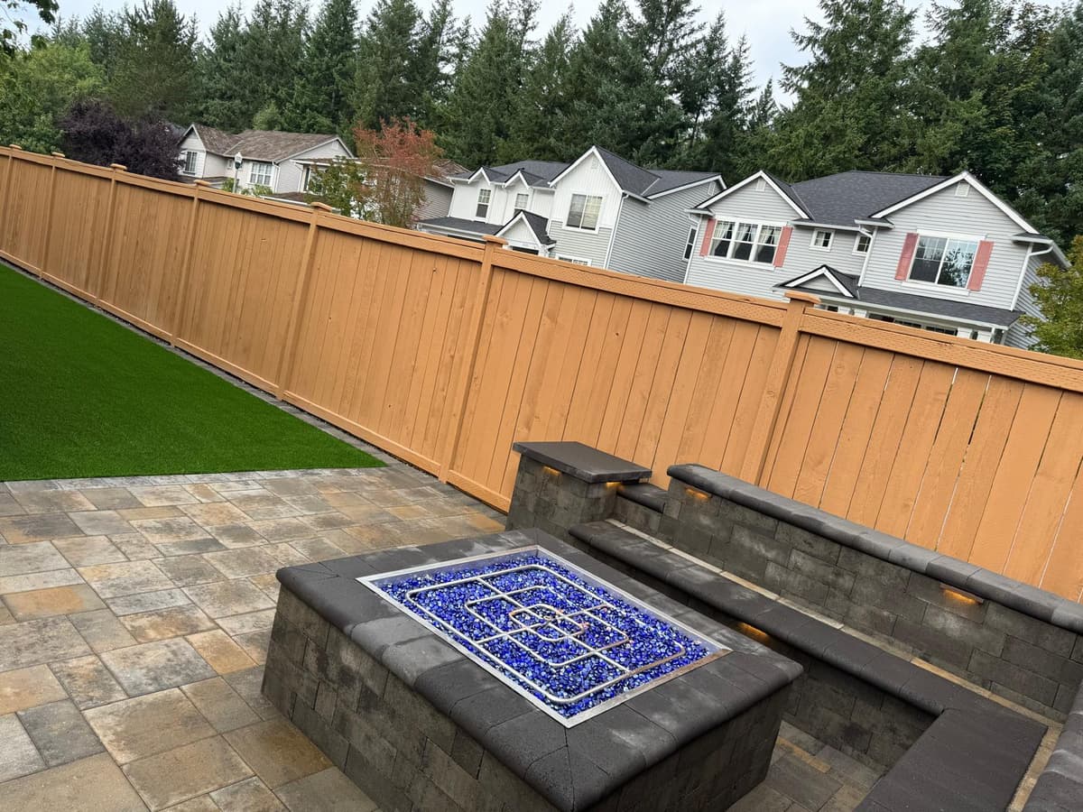 Paver patio with fire pit and seating wall in Renton WA